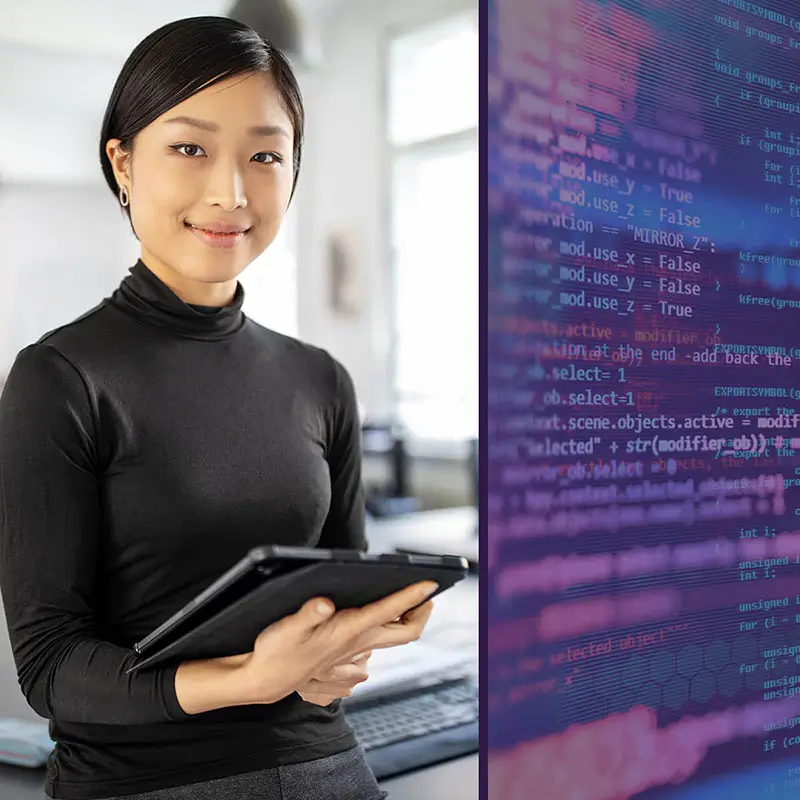 person holding a tablet and data screen