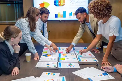 Work colleagues studying data